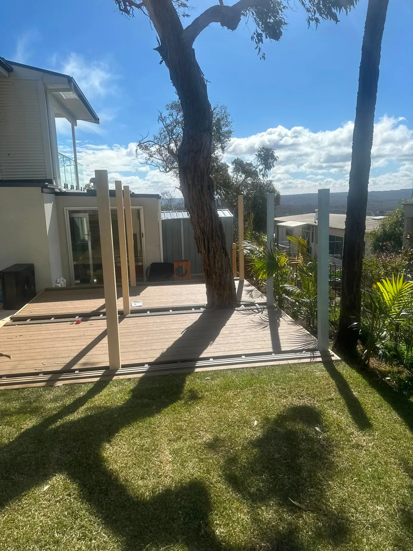 Composite deck built on a sloping site looking out over the ranges
